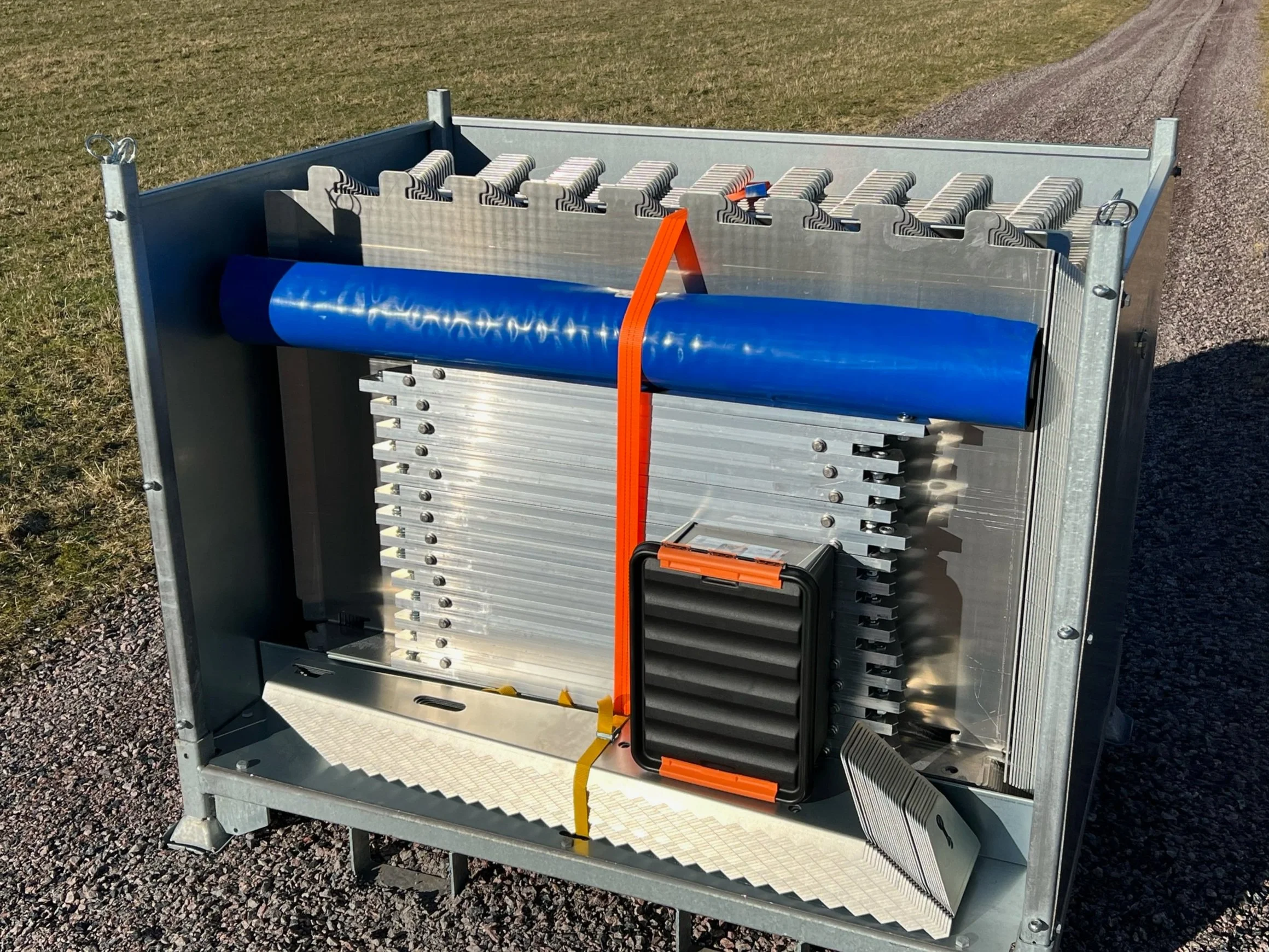 Inero barrier components packed in a transport crate